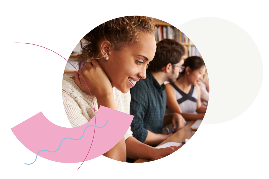 A female student studying in a university library.